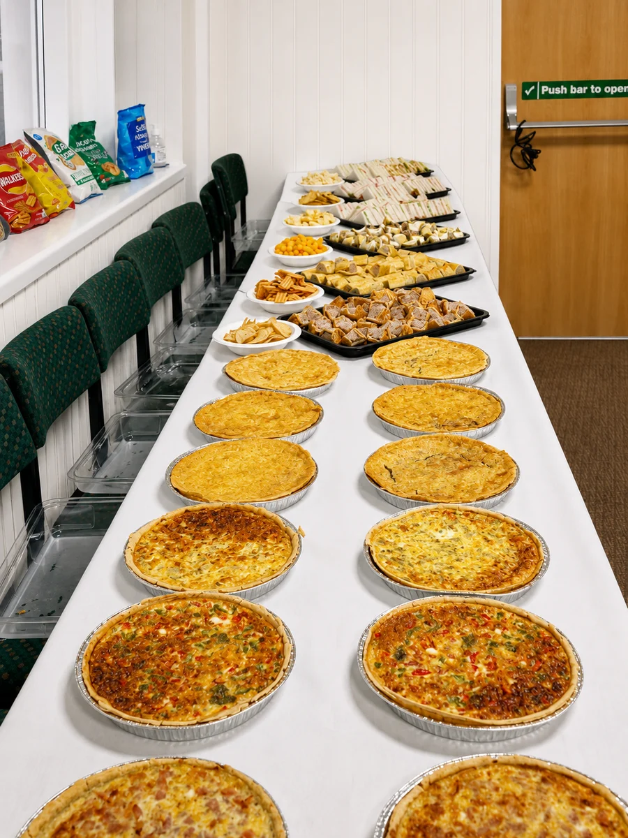 A table of quiches and savoury bakes
